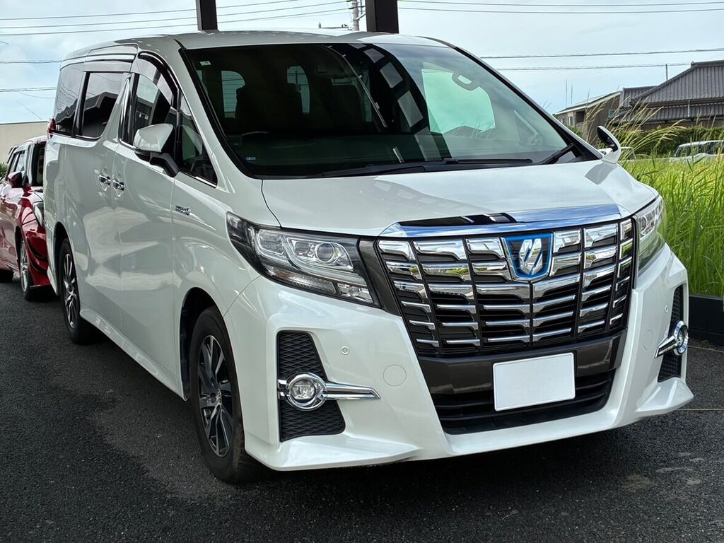 納車されたトヨタ アルファード ハイブリッド（ホワイトパール）のフロントビュー